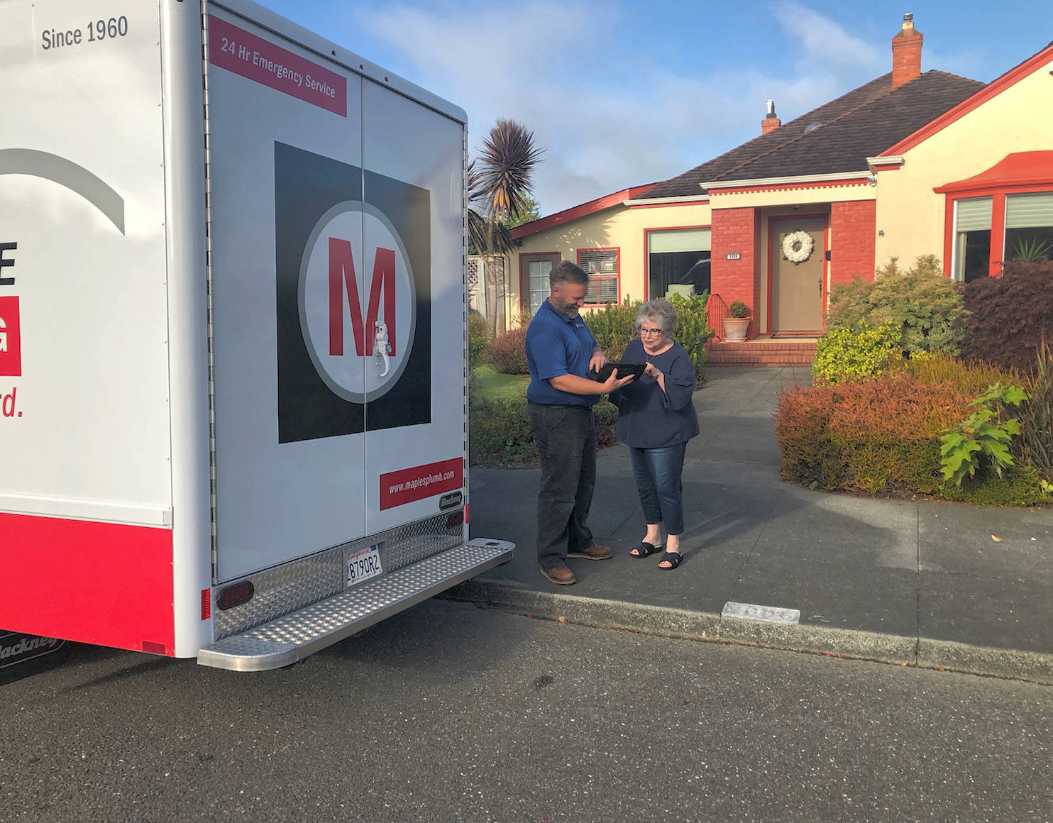 Plumbing technician and customer Arcata California